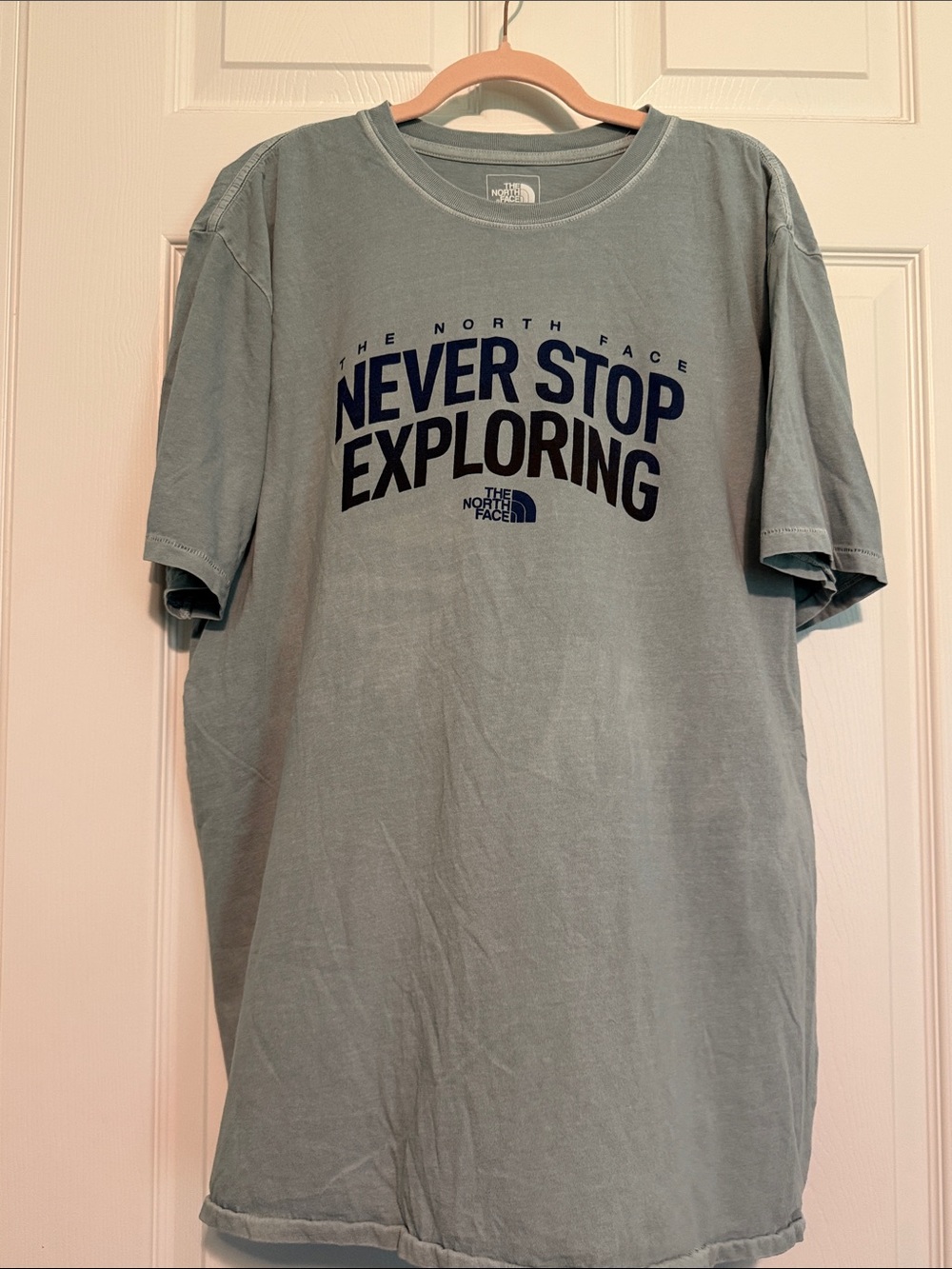 The North Face Sage Green Tee with Navy 'Never Stop Exploring' Print
